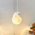Cremefarbene Tier-Pendelleuchte