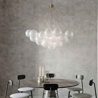 Elegantly illuminate your space: 4 unique glass ball chandeliers!