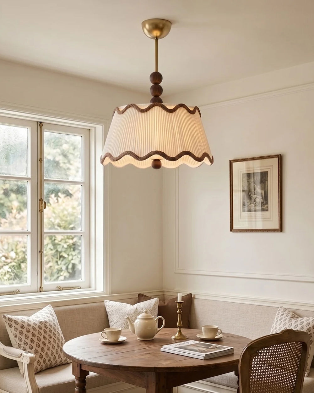 Fabric pendant glowing in a breakfast nook